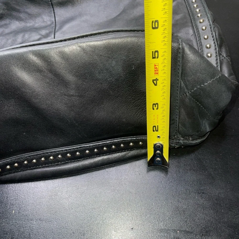 DKNY black leather shoulder bag with stud detailing.